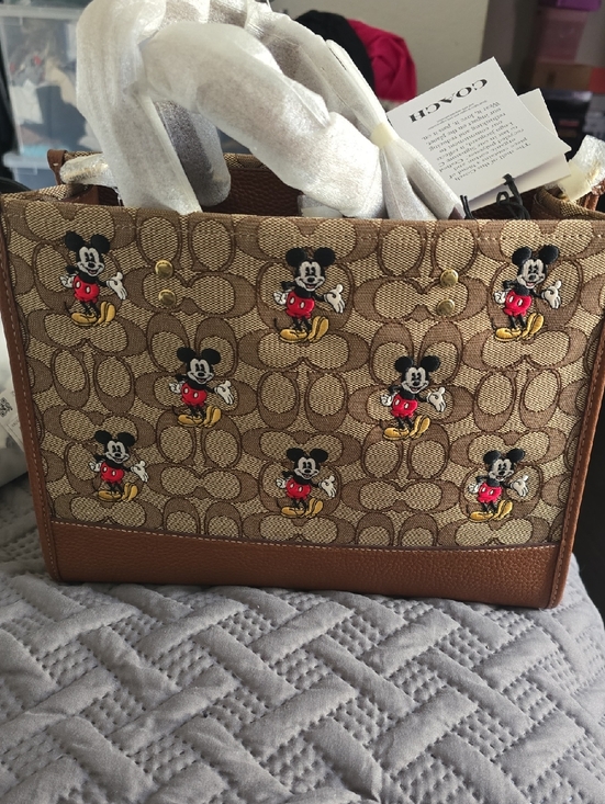 Coach Handbags - Coach Brown Signature Canvas Tote with Mickey Patch Motif